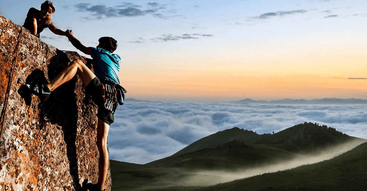 Mountaineer helps partner with climbing – symbol of trust, support and financial help through personal loan